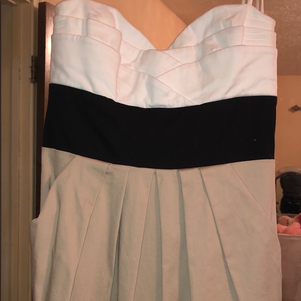 Tan, black and white strapless dress